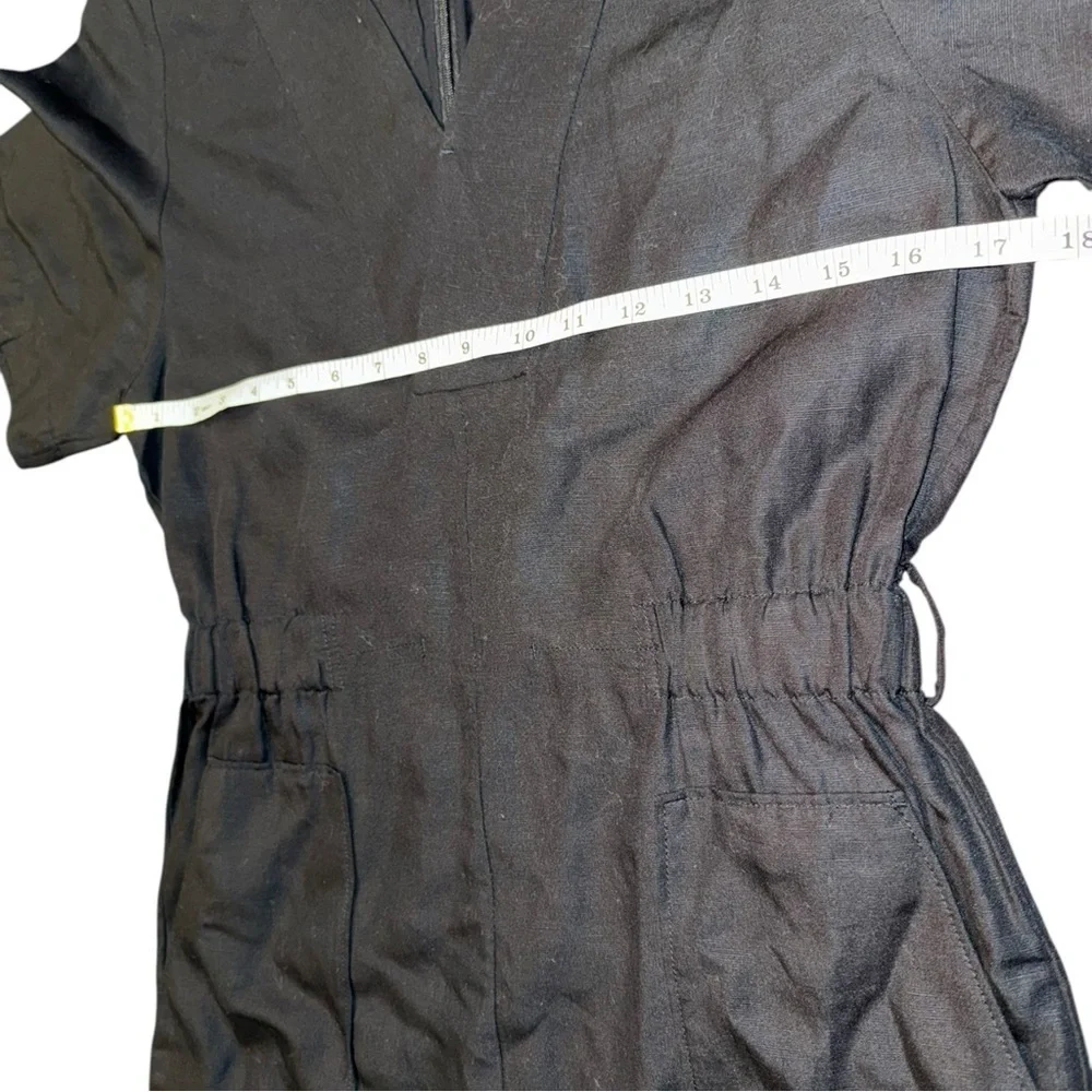 COS v neck belted playsuit 73% TENCEL Lyocell, 22% Linen, 5% Cotton.